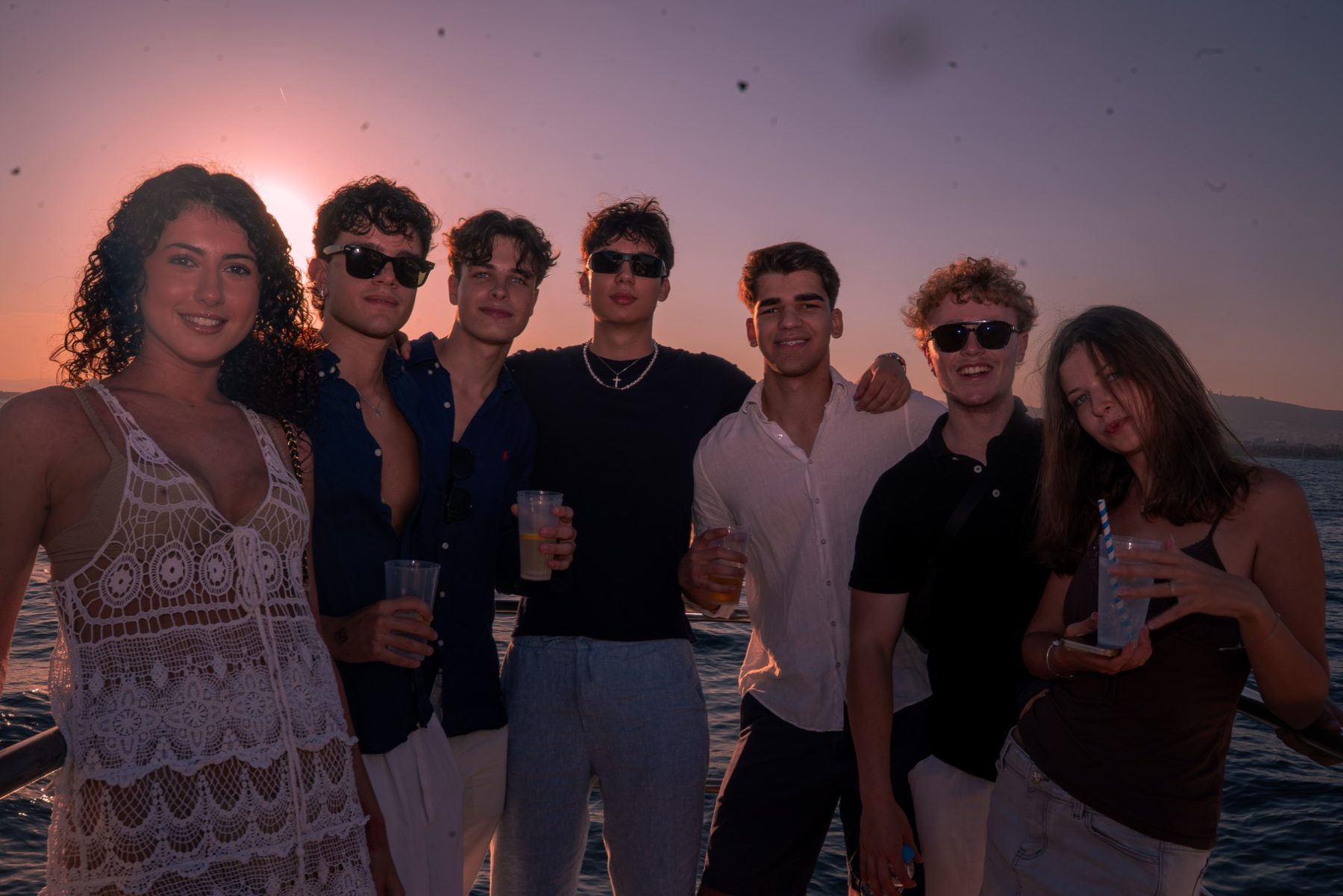 Siroko boat party friends at sunset